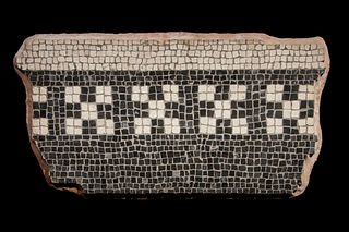 A Roman Mosaic Fragment Panel
Height 12 1/2 x width 24 x depth 2 1/2 inches. 