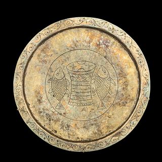 A Byzantine Gilt Silver Paten with Fish and Breadbasket
Diameter 7 inches. 