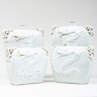 Four Chinese Celadon Glazed Porcelain Dragon Flasks