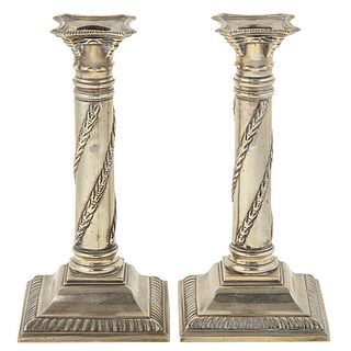 A Pair of George III Paktong Candlesticks