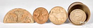 Four carved butterprints, 19th c.
