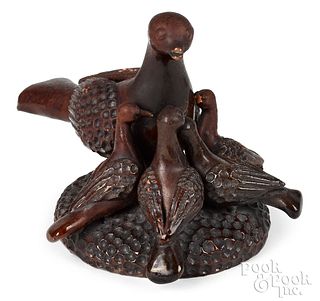 Redware bird and young group, 19th c.