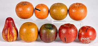 Nine painted redware fruit banks, late 19th c.