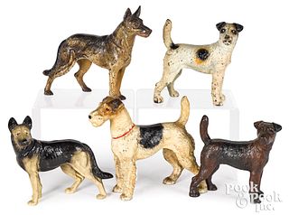 Five painted cast iron dog doorstops, early 20th c