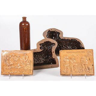 A Group of Continental Redware Including Two Plaques, a Bottle and a Lamb Mold