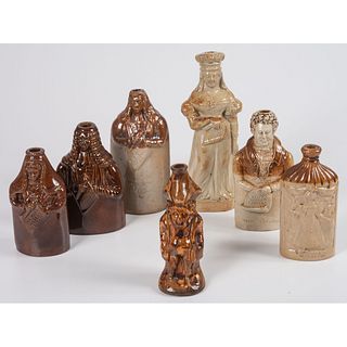 Seven Figural Stoneware Flasks