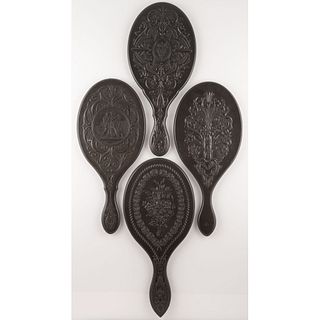 Four Thermoplastic Hand Mirrors with Figural and Floral Motifs