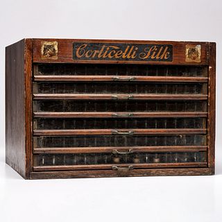A Corticelli Silk Stenciled Tabletop Spool Cabinet 