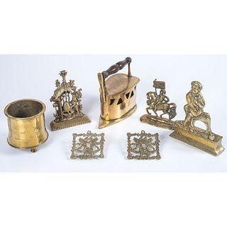 A Group of Brass Door Stops and Other Articles