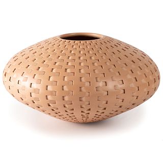 A Ceramic Vase by Michael Wisner with a Basketweave Pattern