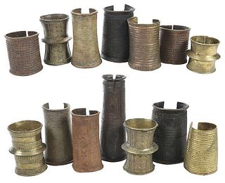 Group of 14 African Bronze Bangles and Cuffs