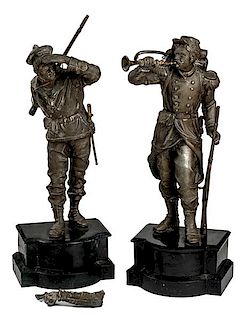 A Pair of White Metal Soldier and Sailor Figure Sculptures 