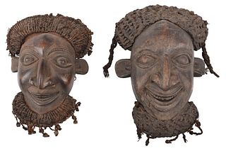 Two Carved Wood and Fiber Oku Kam Masks