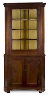 Pennsylvania walnut corner cupboard, ca. 1800,