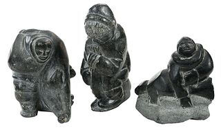 Three Inuit Stone Carvings of Seal Hunters