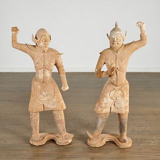Pair large Chinese pottery guardian figures