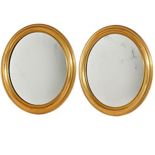 Pair English brass oval convex mirrors