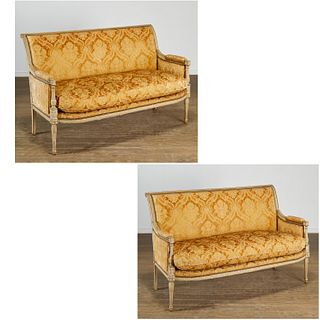 Pair Louis XVI style carved and painted sofas