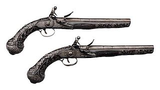 Pair of Silver-Mounted Mid-Eastern Flintlock Pistols 