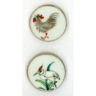 A SMALL CARD OF ASIAN PORCELAIN SET IN SILVER BUTTONS