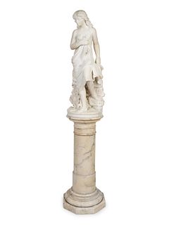 A Continental Marble Figure of a Female Bather on Pedestal
Figure height 33 x width 12 x depth 12 inches; pedestal height 30 x diameter 14 1/2 inches.