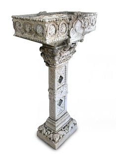 An Italian Gothic Style Metal Mounted Baptismal Font
Height 51 x width 26 x depth 14 1/2 inches.
