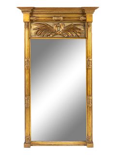 A Neoclassical Style Gilt Framed Trumeau Mirror
Height 51 x 29 1/4 inches.