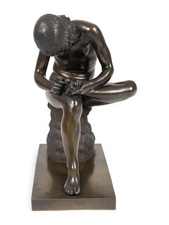A Continental Bronze Figure of Spinario, After the Antique
Height 18 1/2 x width 8 x depth 13 1/2 inches.