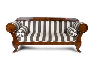A Biedermeier Style Walnut Sofa
Height 39 x width 90 x depth 27 inches.