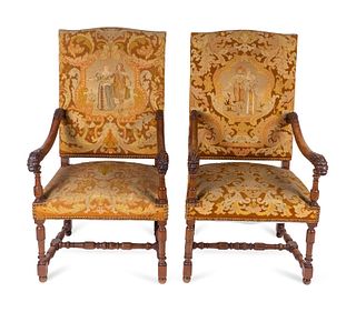 A Pair of Louis XIII Style Carved Walnut Needlepoint Upholstered Chairs
Height 47 x width 25 x depth 26 inches.