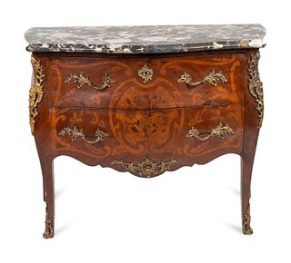 A Louis XV Style Gilt Bronze Mounted Marquetry Bombe Commode with Marble Top 
Height 36 x width 44 x depth 19 1/2 inches.