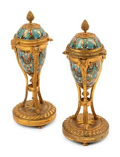 A Pair of Louis XVI Style Gilt Bronze Mounted Champleve Cassolettes
Height 9 inches.