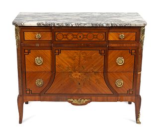 A Louis XV/XVI Style  Transitional Marble Top Commode
Height 34 x width 40 x depth 17 inches.