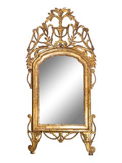 A Louis XVI Style Giltwood Mirror
Height 76 x width 36 inches.