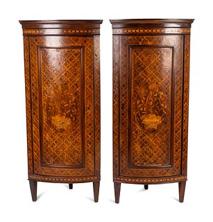 A Pair of Louis XVI Style Mahogany Corner Cabinets
Height 58 3/4 x width 25 3/4 x depth 16 inches.