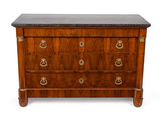 An Empire Style Marble-Top Commode
Height 34 1/2 x width 51 1/4 x depth 23 inches.