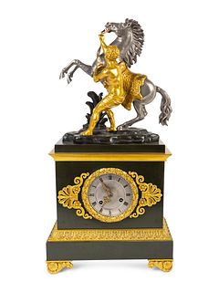 A French Empire Style Bronze Marley Horse Clock
Height 19 3/4 x width 10 inches.