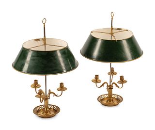 A Pair of French Gilt Bronze Bouillotte Lamps with Tole Shades
Height overall 25 1/2 inches.