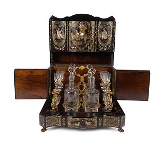 A Napoleon III Mother-of-Pearl Inlaid Cave a Liqueur
Height 11 1/2 inches.
