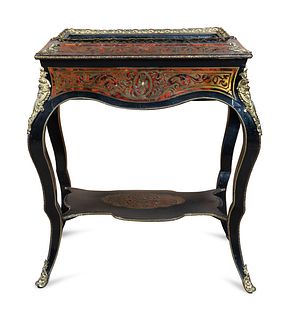 A Napoleon III Style Gilt Bronze Mounted Boulle Marquetry Jardiniere Table
Height 27 3/4 inches.