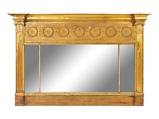 A Neoclassical Giltwood Mirror
Height 34 x width 50 inches.