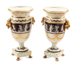 A Pair of Minton Style Pate-sur-Pate Vases
Height 16 1/2 inches.