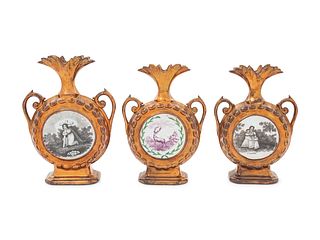 Three English Copper Lusterware Clock Vases
Height of tallest 7 1/4 inches.