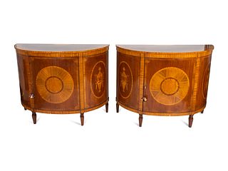 A Pair of George III Style Inlaid Mahogany Demilune Commodes
Height 36 1/2 x width 48 x depth 19 3/4 inches.