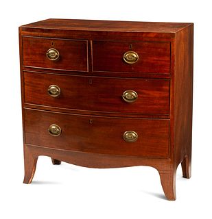 A George III Mahogany Bowfront Chest of Drawers
Height 35 1/2 x width 34 1/2 x depth 18 1/2 inches.