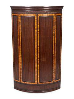 A George III Mahogany and Cross-banded Hanging Corner CabinetHeight 45 x width 26 3/4 x depth 19 inches.