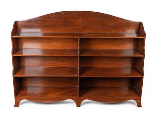 An Edwardian Mahogany Waterfall Front Double Bookcase Height 44 x width 60 x depth 11 1/2 inches.
