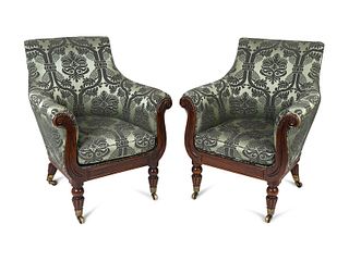 A Pair of Regency Faux Rosewood Upholstered Bergeres Attributed to Gillows Height 38 1/2 x width 30 3/4 x depth 32 1/2 inches.