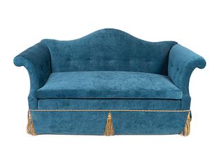 A Camel Back Settee Upholstered in Teal VelvetHeight 38 x width 75 x depth 35 inches.