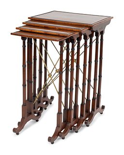 A Regency Cross-banded Rosewood Nest of Four TablesLargest, height 29 x width 19 x depth 14 3/8 inches.